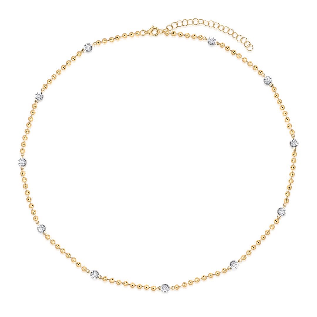Golden orbit ball necklace